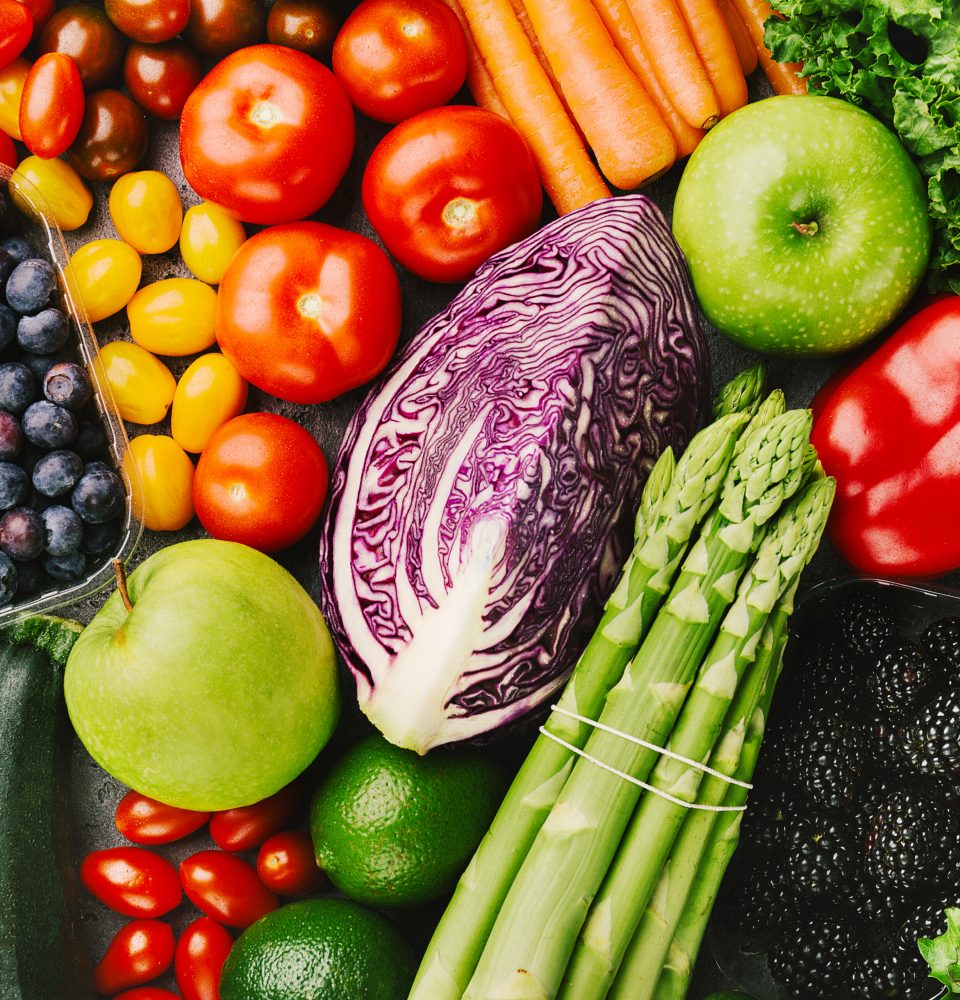 Different tasty vegetables on rough background
